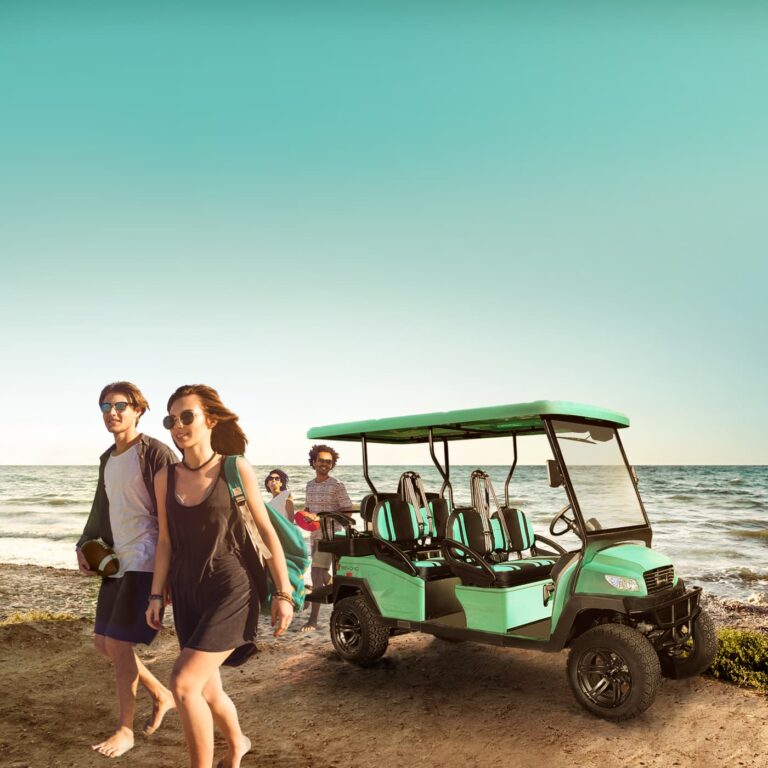 Couples on there vacations with Bintelli Street legal Golf cart