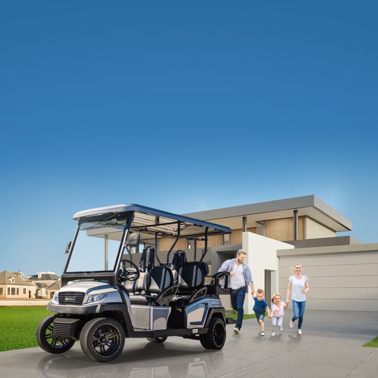 A Family of four enjoying their brand new Bintelli A 6 seater street legal golf cart in Titanium parked on their driveway