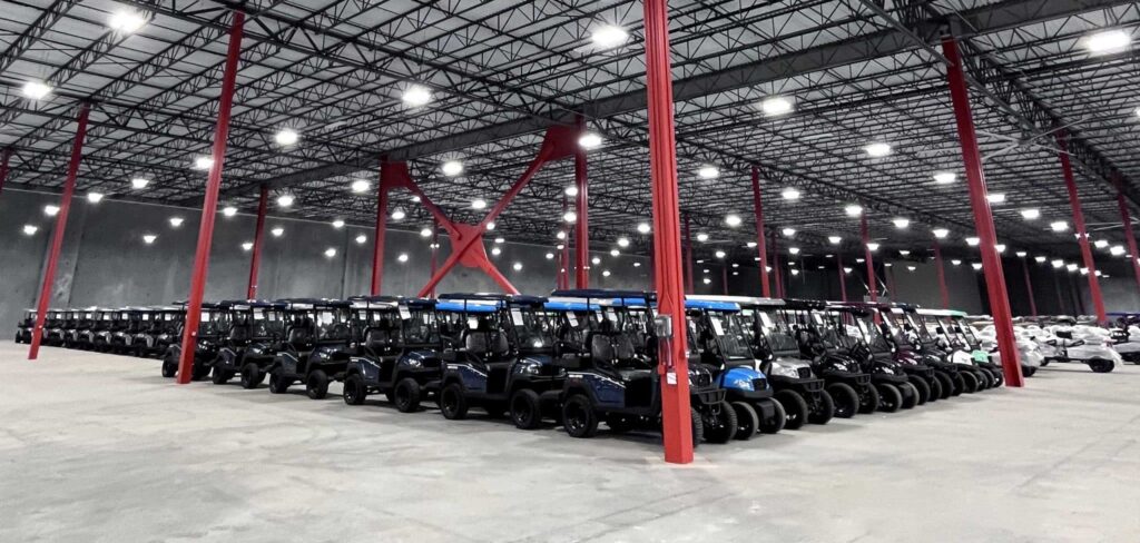 Bintelli Golf Cart Warehouse with Bintelli Beyond Lifted 4PR street legal golf cart and Bintelli Beyond 4PR street legal golf cart fleet in Ocean Blue, Black, Burgundy, Hydro, Mint, Navy, Red, Titanium and White