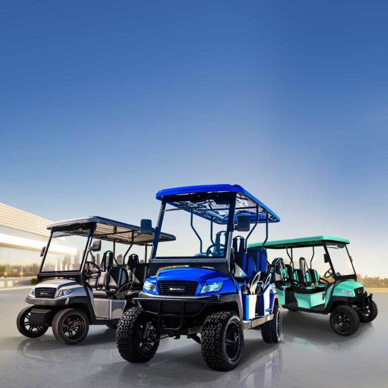 Bintelli Beyond Lifted 6PR street legal golf cart in Hydro, Mint and Titanium parked in a luxurious house