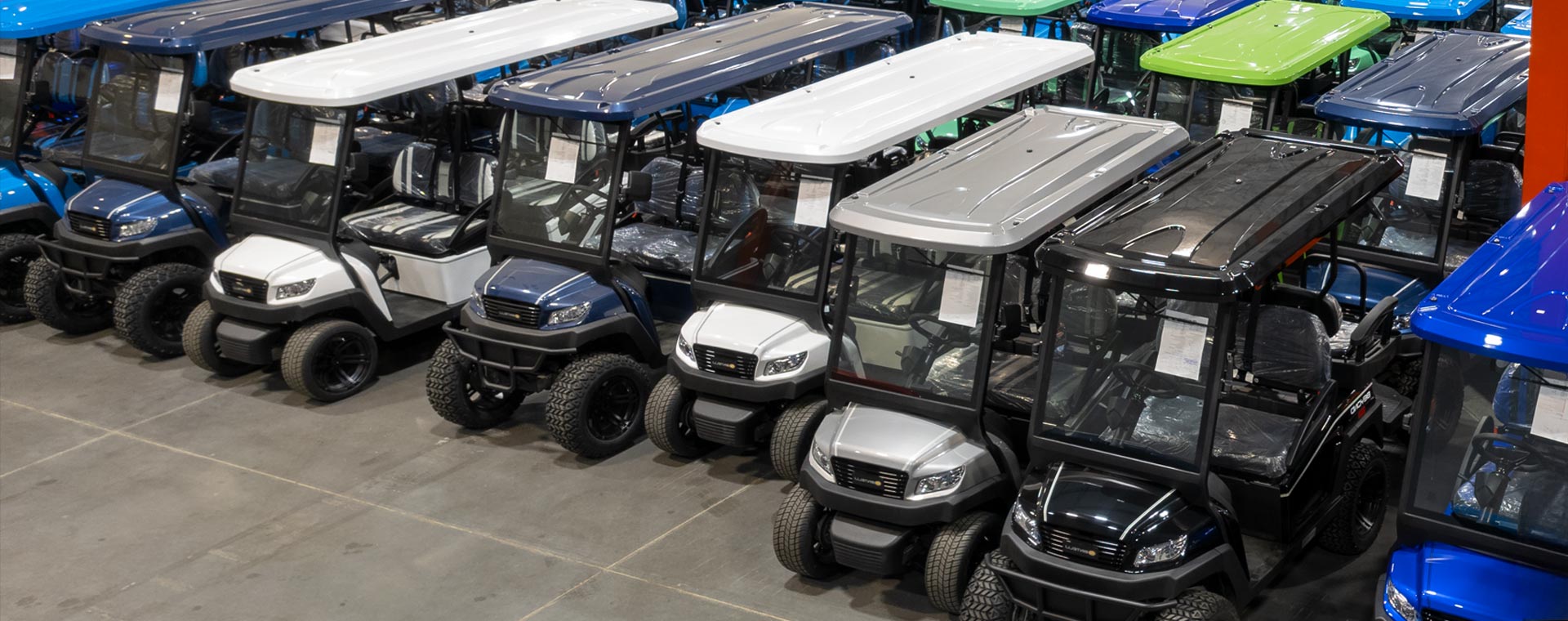 Bintelli Golf Cart Warehouse with Bintelli Beyond Lifted 4PR street legal golf cart and Bintelli Beyond 4PR street legal golf cart fleet in Ocean Blue, Black, Burgundy, Hydro, Mint, Navy, Red, Titanium and White