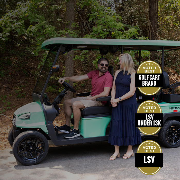 couple on the nexus 6 seater golf cart