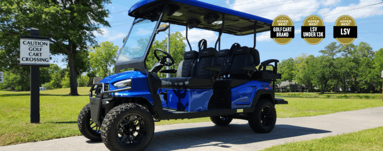 A blue Bintelli Nexus Gen2 on a golf cart path at a golf cart crossing